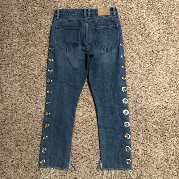 Size 26 unique jeans with silver grommets down front and back side - Picture 4 of 4